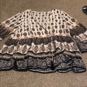 V Neck patterned blouse.